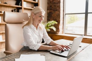 woman working on her computer